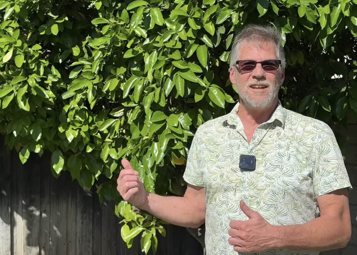 Len, a featured PickFresh seller, with his front-yard grapefruit tree